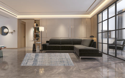 5' X 8' Cream Blue And Ivory Geometric Distressed Stain Resistant Area Rug