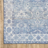 5' X 7' Blue And Grey Oriental Power Loom Stain Resistant Area Rug