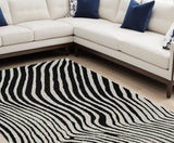 7' X 10' Cream and Black Abstract Worn Faded Area Rug