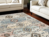 7' X 9' Ivory Tan And Blue Geometric Flatweave Area Rug