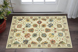 3' X 5' Ivory Yellow And Dark Orange Oriental Area Rug With Fringe