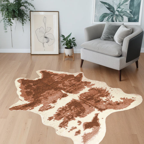 4' X 5' Brown And Ivory Faux Cowhide Animal Print Area Rug