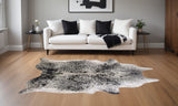 5' X 7' Black And White Cowhide Area Rug