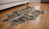 5' X 7' Brown And Black Cowhide Area Rug