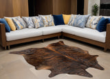 5' X 7' Brown And Black Cowhide Cowhide Print Area Rug