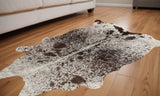 5' X 7' Brown And White Cowhide Area Rug