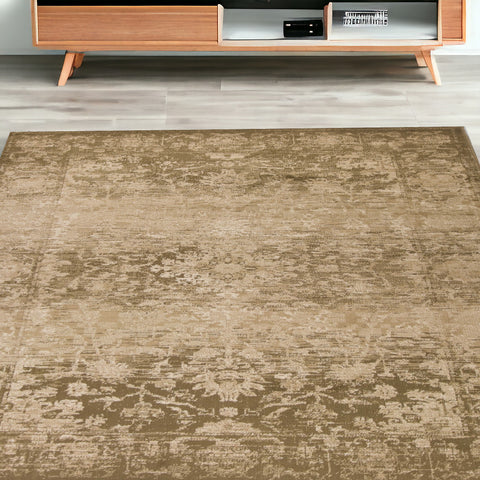 5' X 8' Beige And Tan Floral Medallion Distressed Area Rug