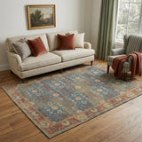 5' X 7' Blue Red And Beige Floral Medallion Hand Woven Distressed Area Rug