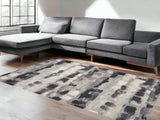 5' X 8' Gray Black And Ivory Abstract Area Rug