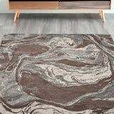 5' X 8' Brown And Ivory Abstract Area Rug
