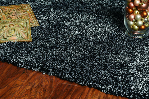 5' X 7' Black And White Shag Hand Woven Area Rug
