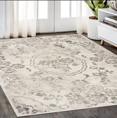 5' X 8' Gray And Tan Floral Distressed Area Rug
