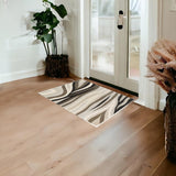 2' X 4' Beige Ivory And Black Wool Abstract Hand Tufted Area Rug