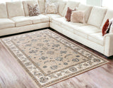 5' X 8' Beige And Ivory Floral Medallion Area Rug