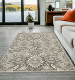 5' X 8' Gray And Ivory Floral Medallion Area Rug
