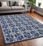 5' X 8' Blue And Ivory Floral Medallion Area Rug
