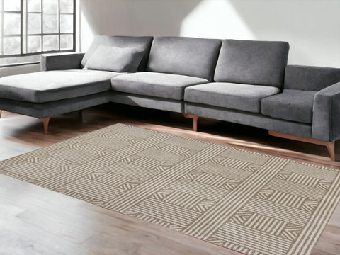 5' X 8' Beige And Ivory Geometric Indoor Outdoor Area Rug