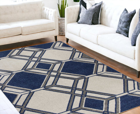 5' X 8' Blue Ivory And Gray Geometric Area Rug