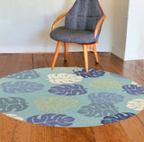 7' Turquoise And Ivory Botanical Leaves Hand Tufted Round Rug