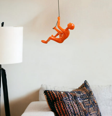6" X 3" Orange Resin Climbing Man Hanging Dimensional Sculpture