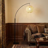 77" Antiqued Bronze Arched Floor Lamp With Groovy Beige Abstract Wicker Globe Shade