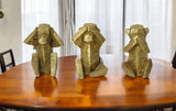 Set of Three 7" Gold Resin Tabletop Sculpture