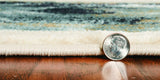 5' X 8' Ivory And Blue Southwestern Area Rug