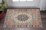 2' X 4' Blue Orange And Black Jute Medallion Hand Woven Area Rug