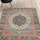 5' X 7' Blue Orange And Black Jute Medallion Hand Woven Area Rug
