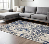 7' X 9' Blue Gray And Ivory Abstract Area Rug