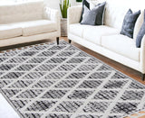 5' X 8' Cream And Charcoal Geometric Area Rug