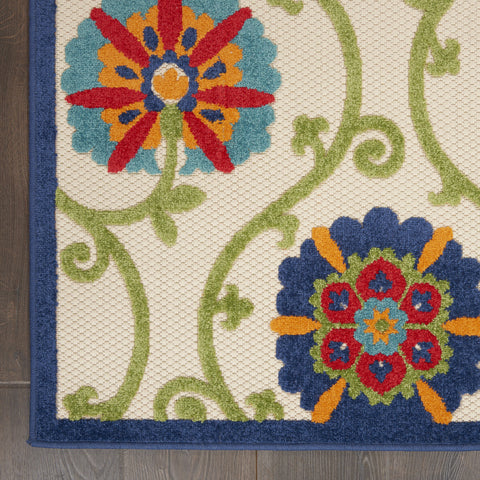 5' X 8' Ivory And Blue Floral Indoor Outdoor Area Rug