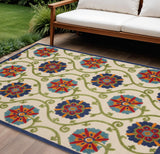 8' X 11' Ivory And Blue Indoor Outdoor Area Rug