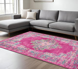 7' X 10' Fuchsia And Blue Oriental Distressed Area Rug