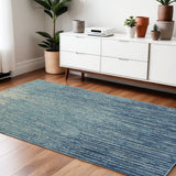 4' X 6' Blue And Ivory Abstract Area Rug