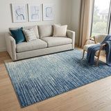 5' X 7' Blue And Ivory Abstract Area Rug