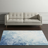 5' X 7' Blue And Ivory Abstract Area Rug