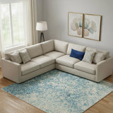 7' X 10' Blue And Ivory Abstract Area Rug