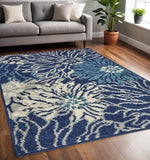 5' X 7' Blue And Ivory Floral Area Rug