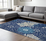 7' X 10' Blue And Ivory Floral Area Rug