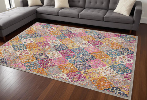 7' X 10' Gray Blue And Orange Quatrefoil Distressed Area Rug