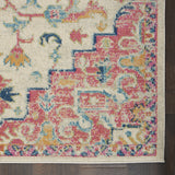 7' X 10' Pink And Ivory Southwestern Distressed Area Rug