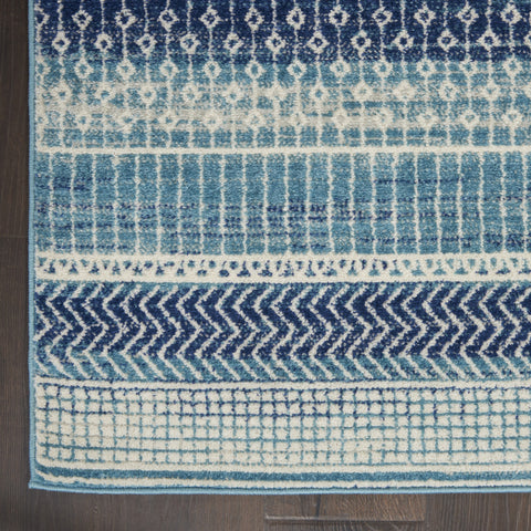 5' X 7' Navy Blue And Ivory Southwestern Area Rug