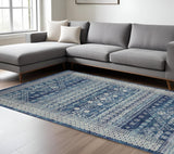 7' X 10' Navy Blue And Ivory Tribal Area Rug