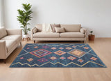 7' X 10' Navy Blue Yellow And Pink Southwestern Distressed Area Rug
