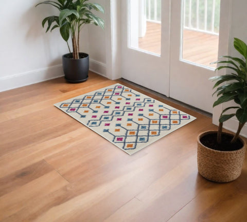2' X 3' Ivory And Blue Geometric Area Rug