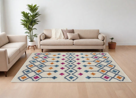 7' X 10' Ivory And Blue Geometric Area Rug