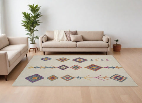 7' X 10' Blue Ivory And Pink Geometric Area Rug