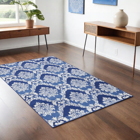 4' X 6' Blue And Ivory Damask Distressed Area Rug