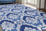 5' X 7' Blue And Ivory Damask Distressed Area Rug